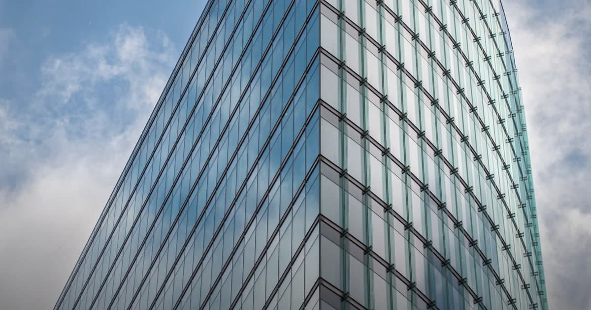Stock photograph of a glass office building exterior