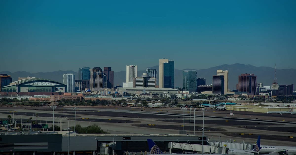 Downtown Phoenix skyline seen beyond the runways at Phoenix Sky Harbor International Airport