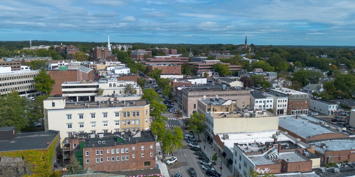 Aerial view along Greenwich Avenue with commercial buildings and surrounding neighborhoods